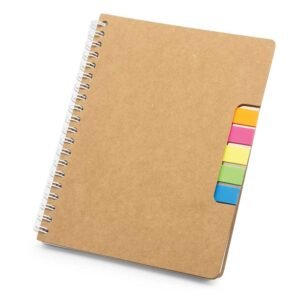 spiral notebook with sticky note and pen